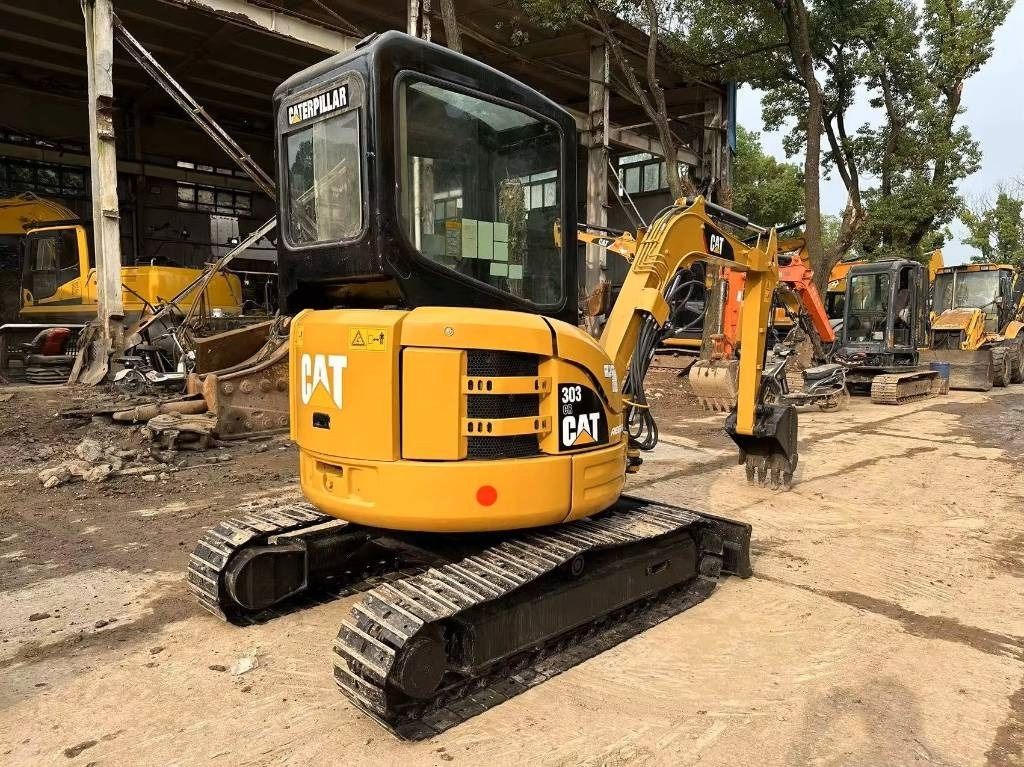 2022 Caterpillar 303CR mini excavator, rear three-quarter view