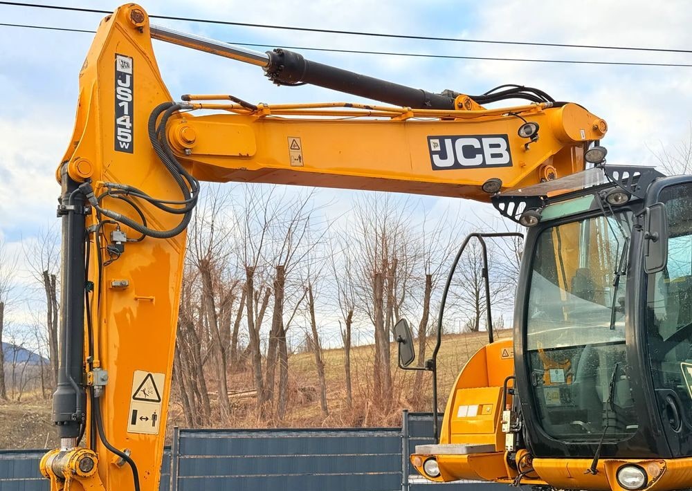 2011 JCB JS145W wheel excavator boom and cab detail