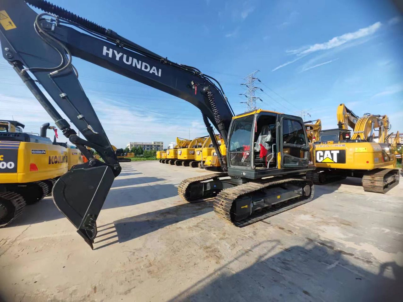 2024 Hyundai 210-9 crawler excavator, front three-quarter view