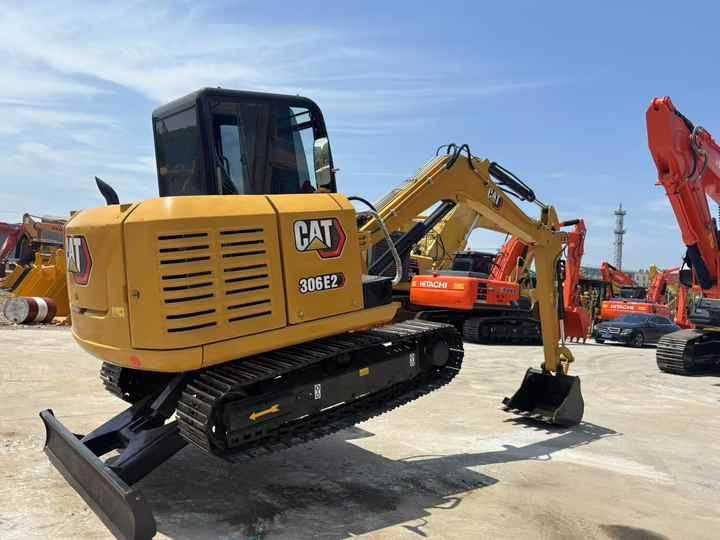 2024 Caterpillar 306E2 excavator, rear three-quarter view