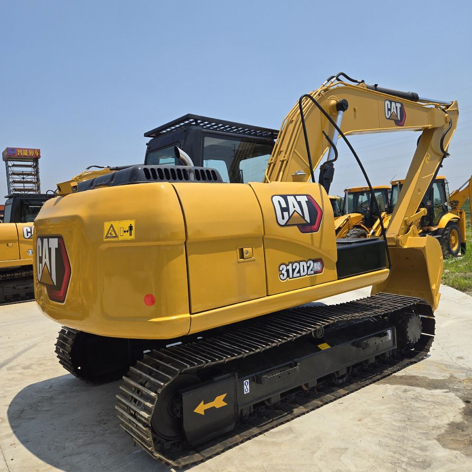 2022 Caterpillar 312D2 excavator, rear three-quarter view