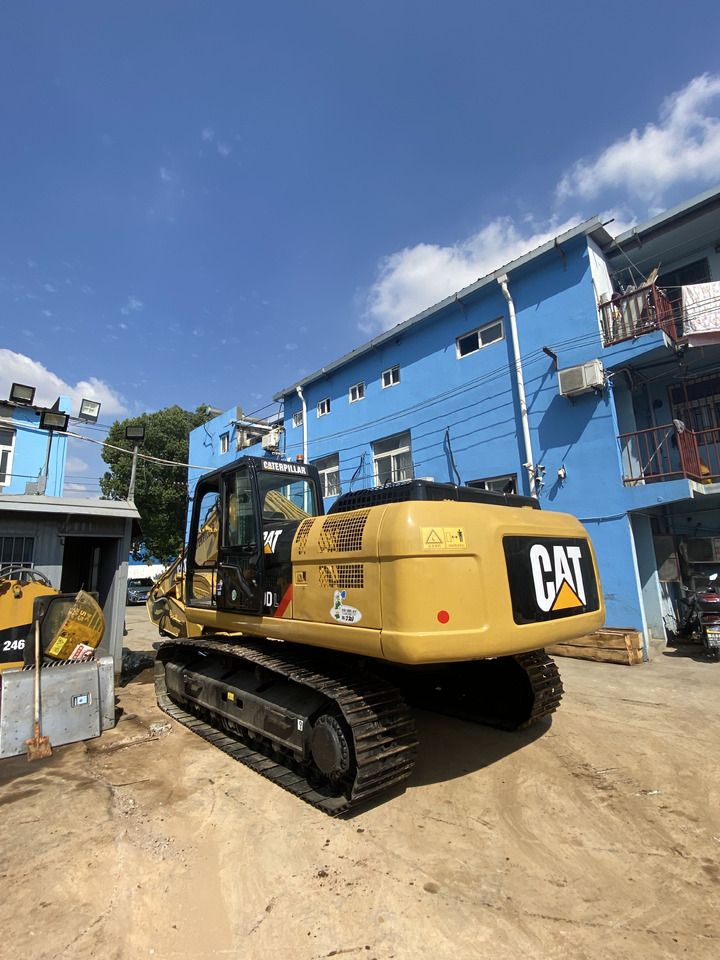 2016 Caterpillar 330DL crawler excavator, rear three-quarter view