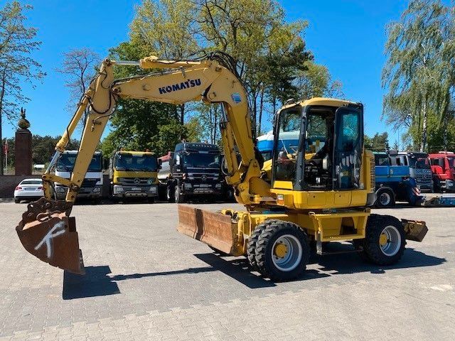 2011 Komatsu PW118 MR-8 wheel excavator, side view