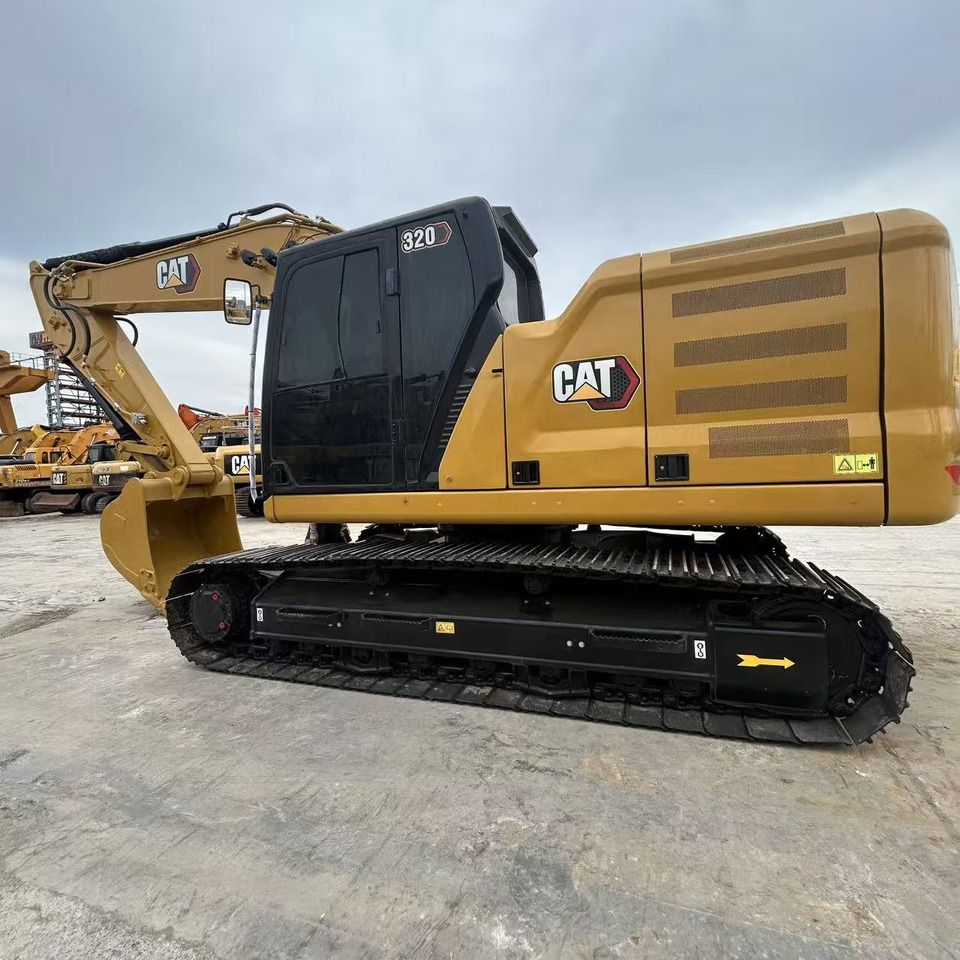 2023 Caterpillar 320 excavator, side profile view
