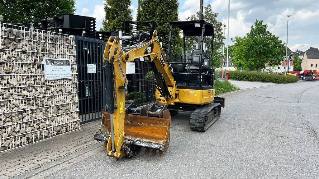 2018 Caterpillar 303E mini excavator, front three-quarter view 2018 Caterpillar 303E mini excavator, front three-quarter view