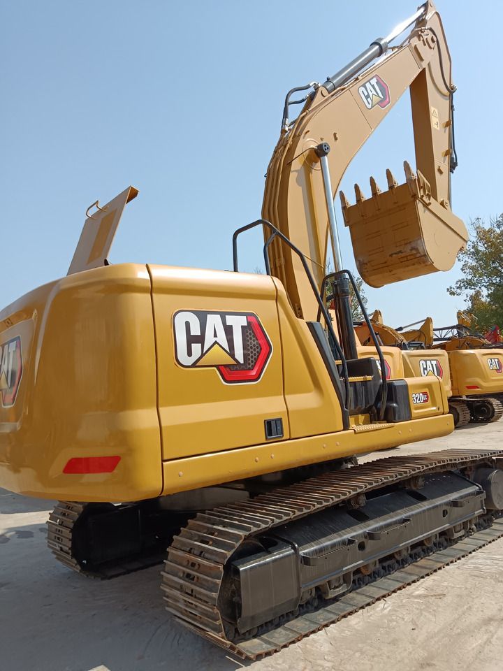 2023 Caterpillar 320GC crawler excavator, rear three-quarter view 2023 Caterpillar 320GC crawler excavator, rear three-quarter view