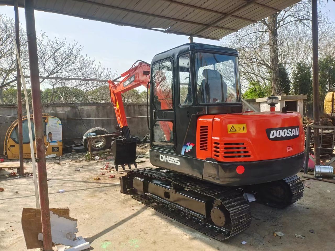 2022 Doosan DH55 crawler excavator, rear three-quarter view 2022 Doosan DH55 crawler excavator, rear three-quarter view