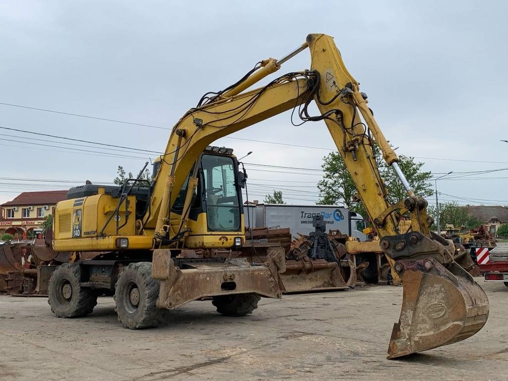 2007 Komatsu PW140-7 wheel excavator, side view