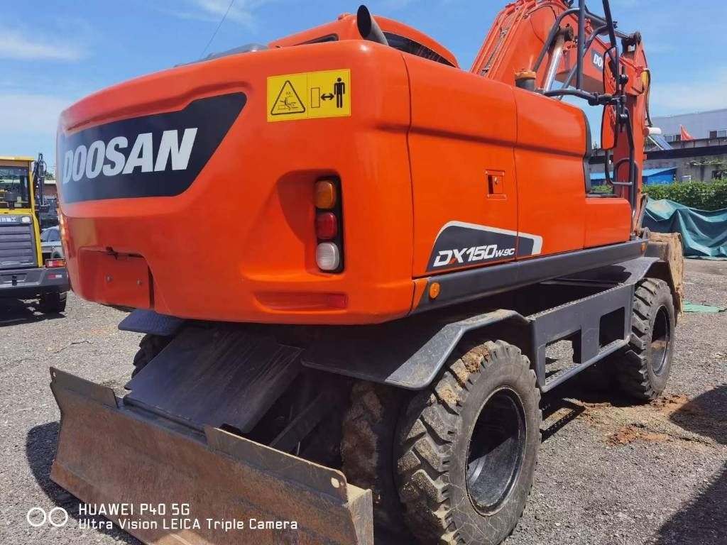 2024 Doosan DX150W-9C wheel excavator rear three-quarter view 2024 Doosan DX150W-9C wheel excavator rear three-quarter view