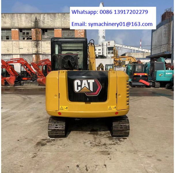 2023 Caterpillar 305.5E2 mini excavator, rear view