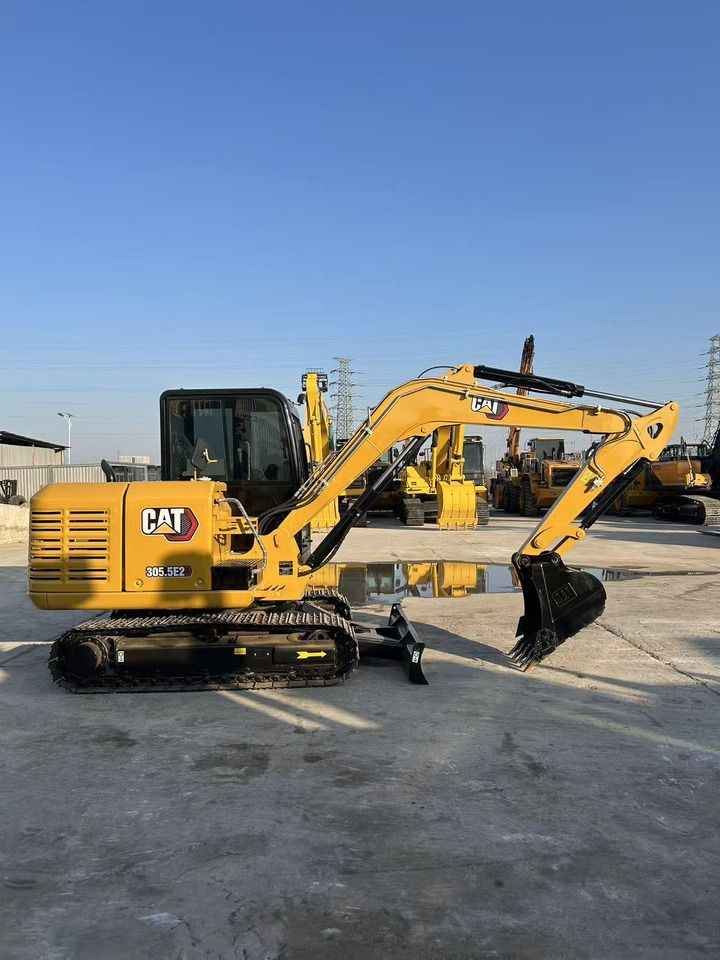 2024 Caterpillar 305.5E2 mini excavator, side view 2024 Caterpillar 305.5E2 mini excavator, side view