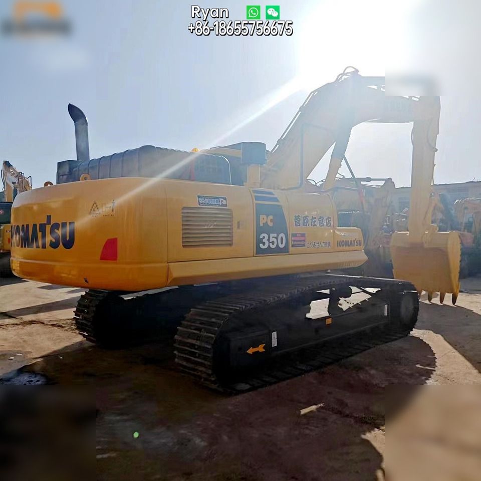 2022 Komatsu PC350-7 crawler excavator, rear three-quarter view 2022 Komatsu PC350-7 crawler excavator, rear three-quarter view