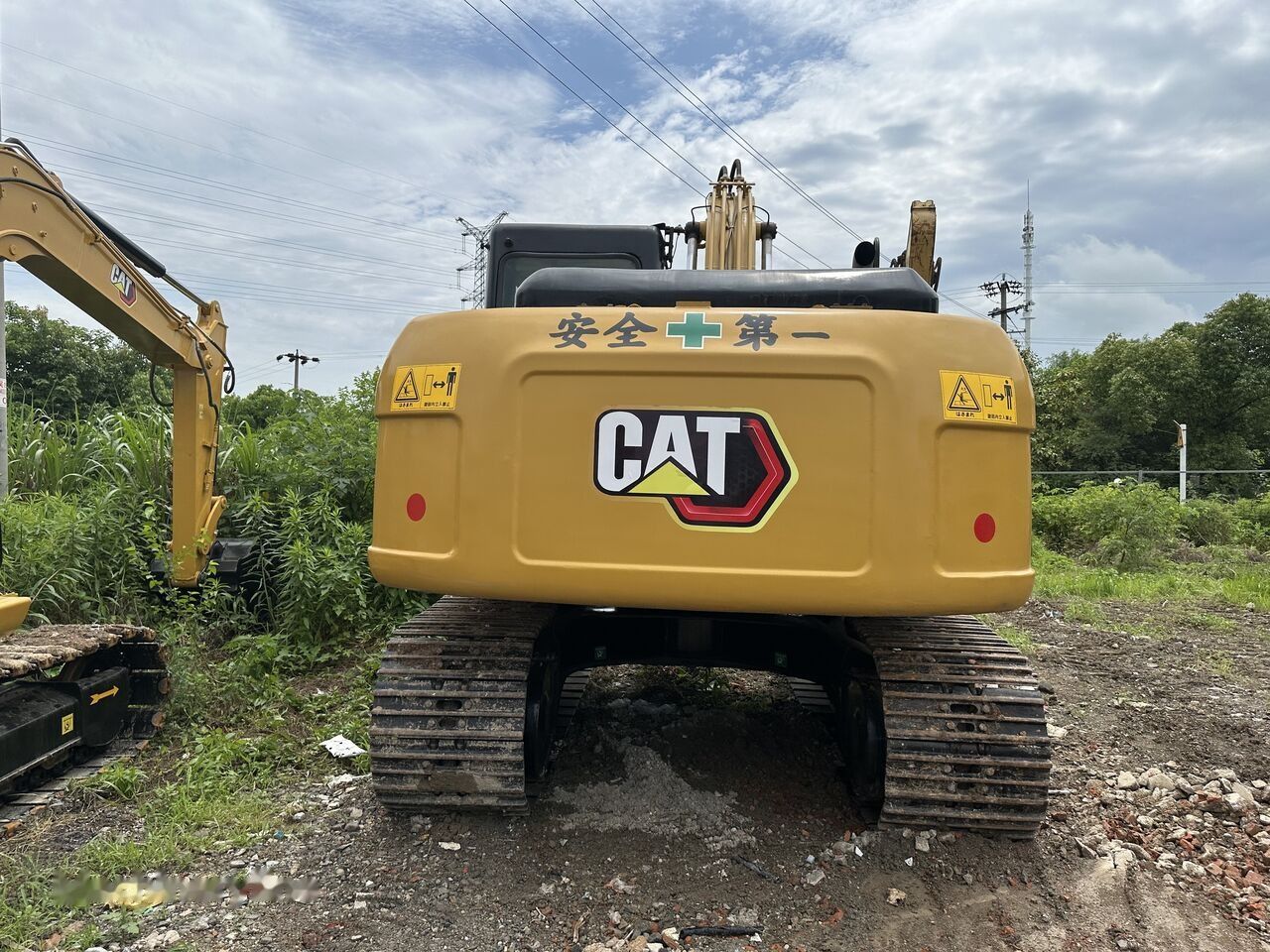 Caterpillar 315D2GC crawler excavator, rear view Caterpillar 315D2GC crawler excavator, rear view