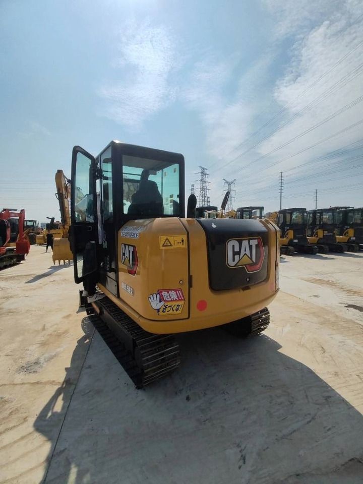 2022 Caterpillar 305.5 mini excavator rear view 2022 Caterpillar 305.5 mini excavator rear view
