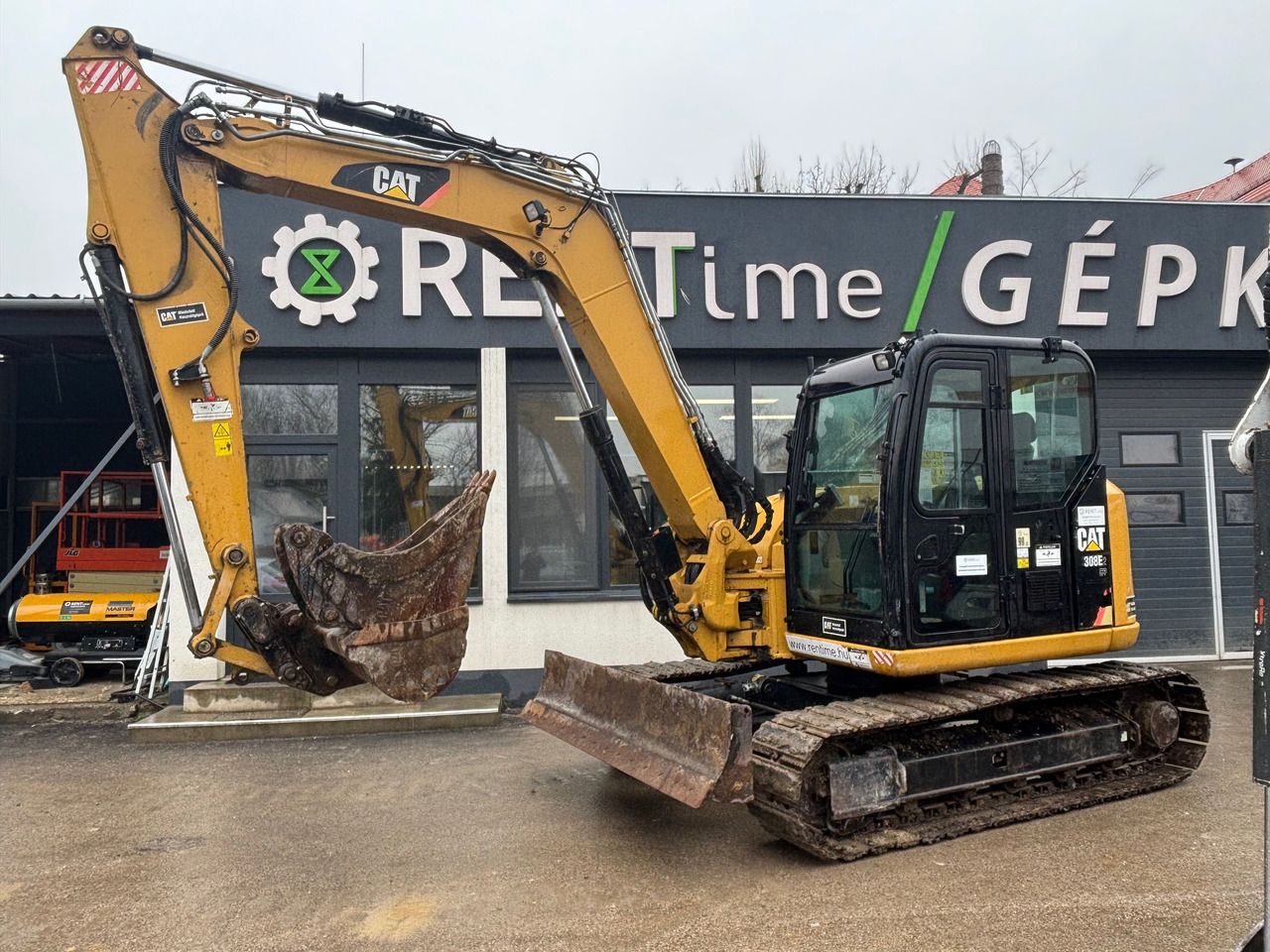 2016 Caterpillar 308E2CR crawler excavator side view 2016 Caterpillar 308E2CR crawler excavator side view