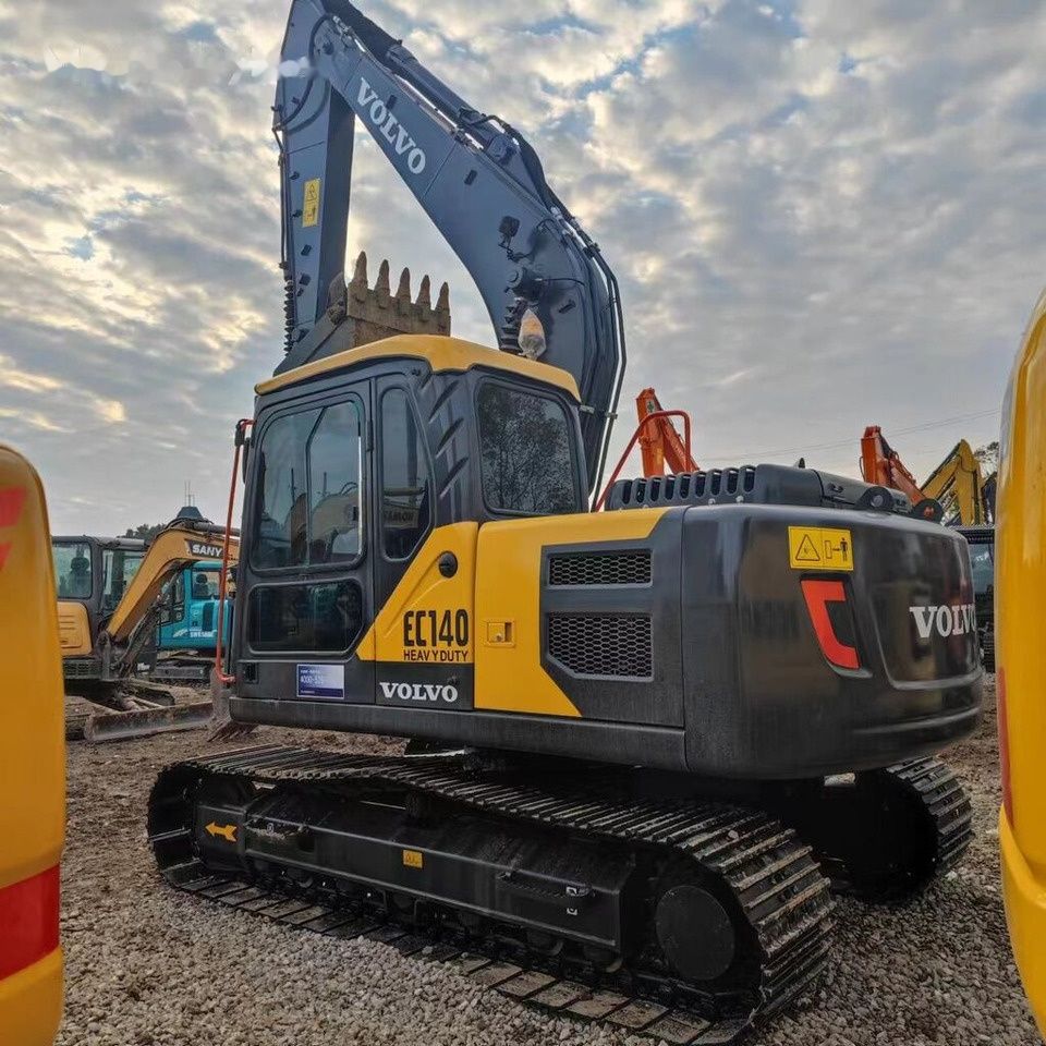 2021 Volvo EC140 crawler excavator, rear three-quarter view