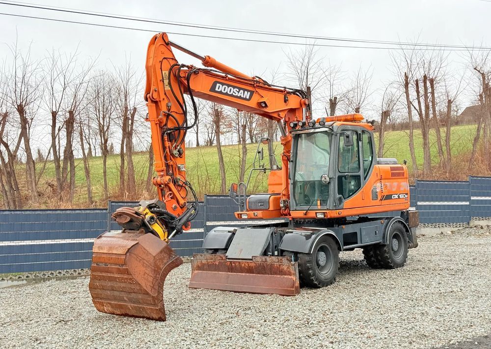 2012 Doosan DX160W wheel excavator, side profile view 2012 Doosan DX160W wheel excavator, side profile view