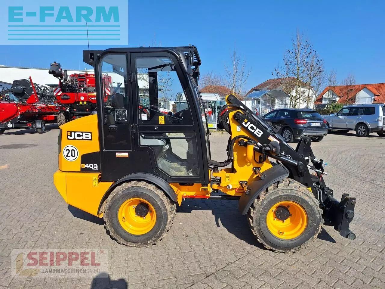 2024 JCB 403PLUS wheel loader, side profile view 2024 JCB 403PLUS wheel loader, side profile view