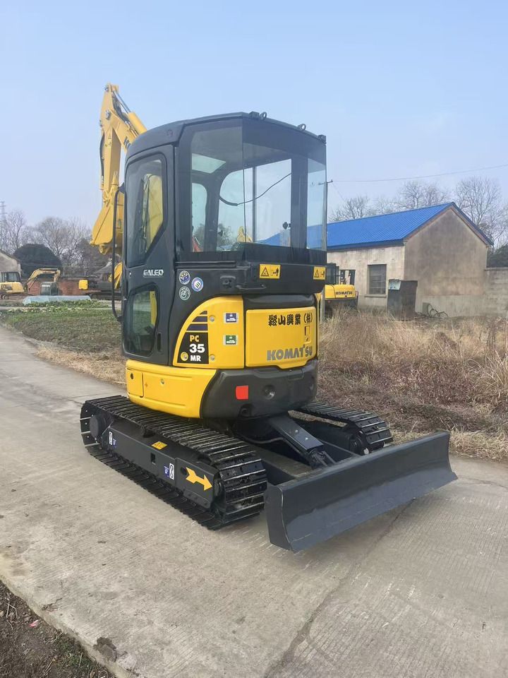 2023 Komatsu PC35 MR mini excavator, rear three-quarter view 2023 Komatsu PC35 MR mini excavator, rear three-quarter view
