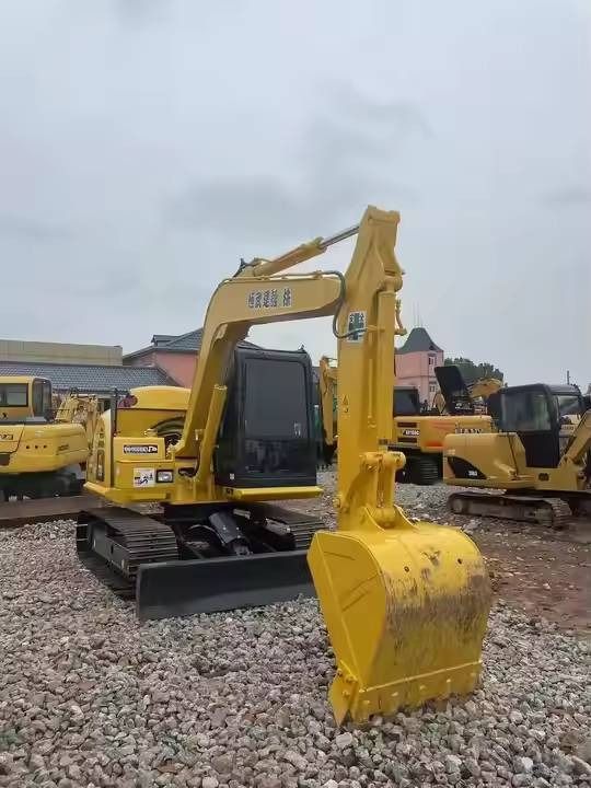 2023 Komatsu PC70-8 mini excavator, front three-quarter view