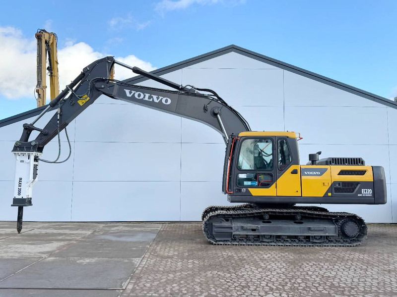 2025 Volvo EC220D crawler excavator side view with hammer attachment 2025 Volvo EC220D crawler excavator side view with hammer attachment
