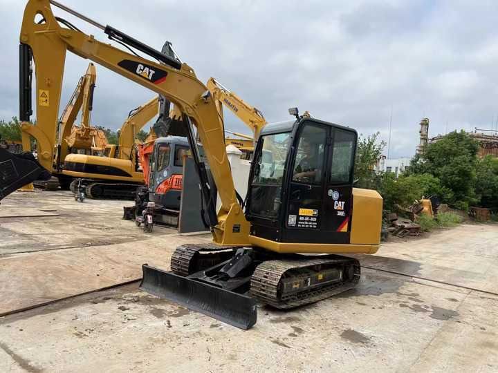 2022 Caterpillar 306E mini excavator, front three-quarter view 2022 Caterpillar 306E mini excavator, front three-quarter view