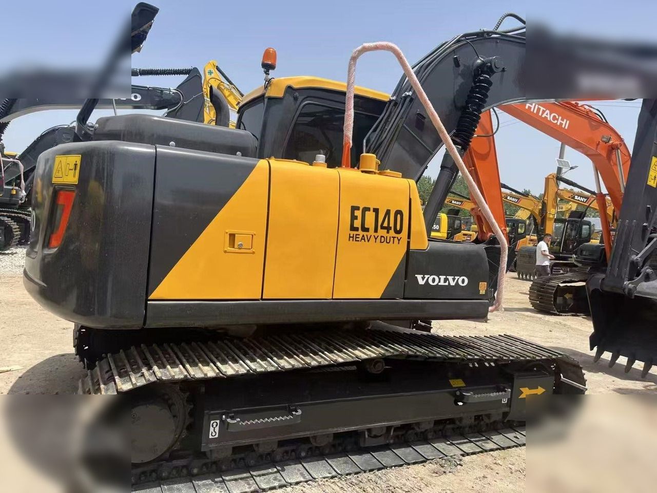 2022 Volvo EC140 crawler excavator, side view 2022 Volvo EC140 crawler excavator, side view