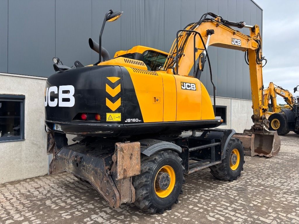 2018 JCB JS160W wheel excavator, rear three-quarter view 2018 JCB JS160W wheel excavator, rear three-quarter view
