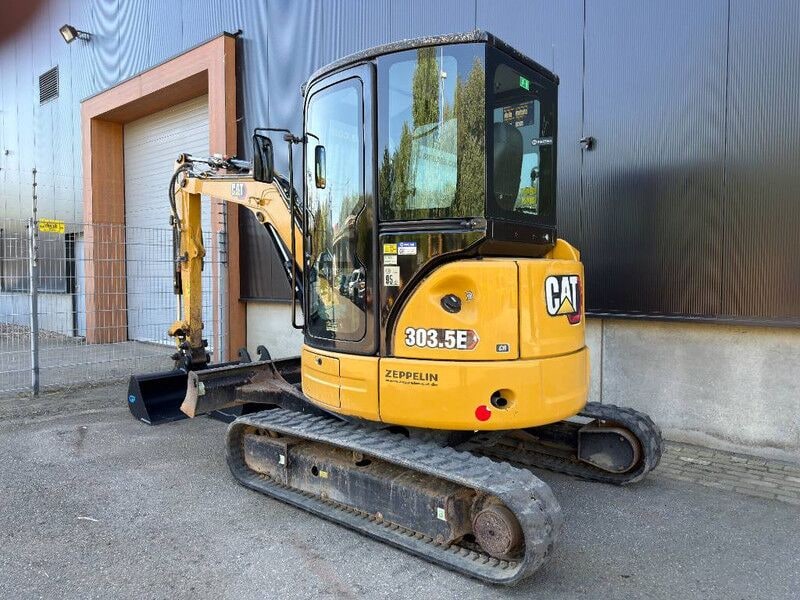 2020 Caterpillar 303.5E mini excavator, rear three-quarter view