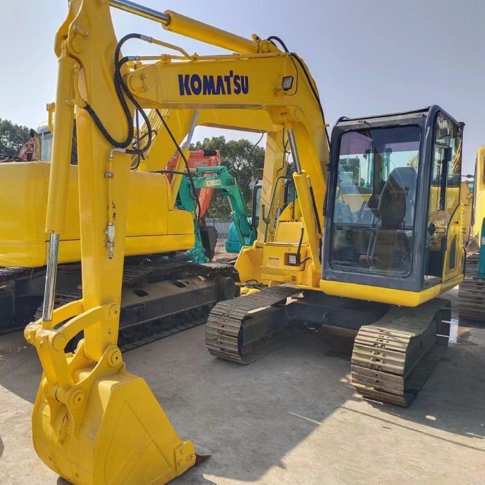 2022 Komatsu PC60-8 mini excavator, front three-quarter view 2022 Komatsu PC60-8 mini excavator, front three-quarter view