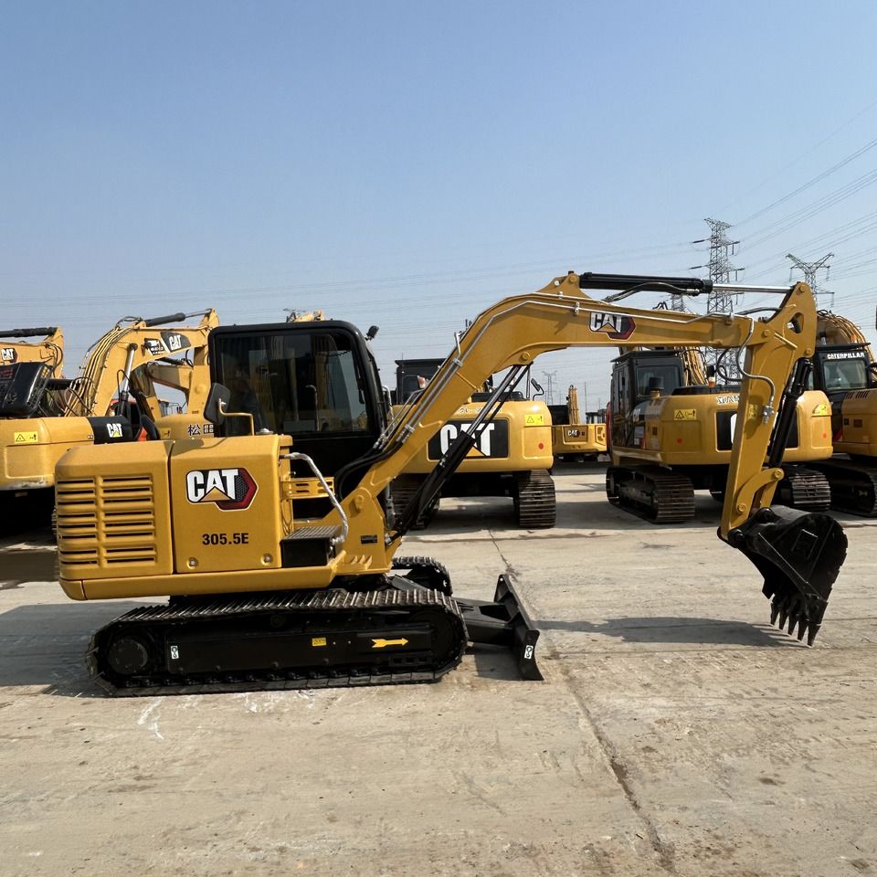 2023 Caterpillar 305.5E mini excavator, side profile view