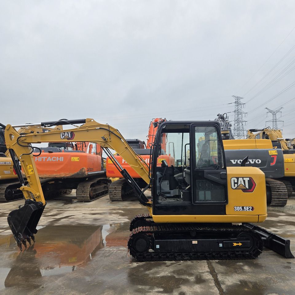 2022 Caterpillar 305.5E2 mini excavator, side view 2022 Caterpillar 305.5E2 mini excavator, side view