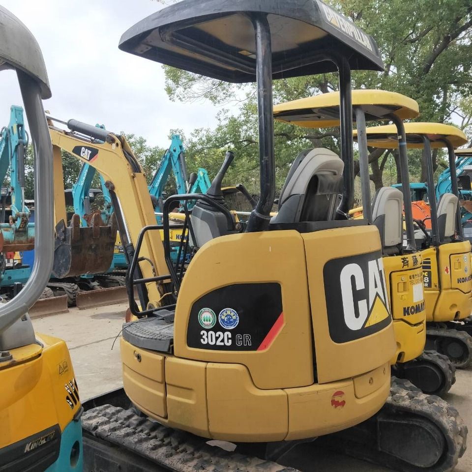 2023 Caterpillar 302C CR mini excavator, rear three-quarter view 2023 Caterpillar 302C CR mini excavator, rear three-quarter view