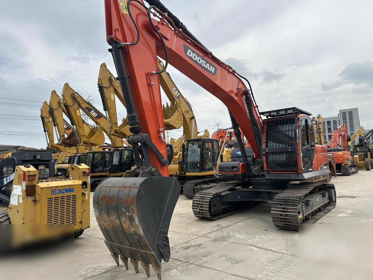 2024 Doosan DX225LCA crawler excavator, front three-quarter view