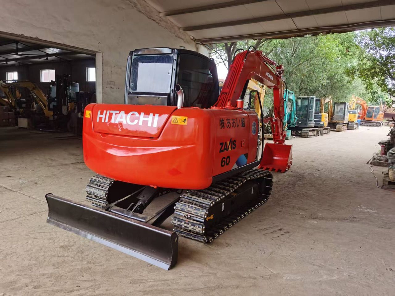 2014 Hitachi Zaxis 60 mini excavator, rear three-quarter view