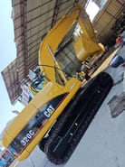 2010 Caterpillar 320C crawler excavator, side view 2010 Caterpillar 320C crawler excavator, side view
