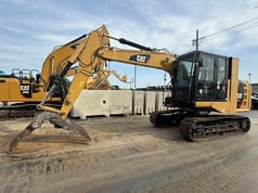 2016 Caterpillar 312E crawler excavator, side view