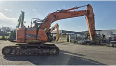 2012 Doosan DX235LCR crawler excavator, side view