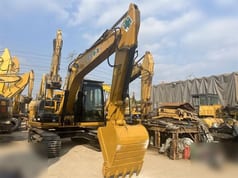 2022 Caterpillar 312D2 crawler excavator, front three-quarter view