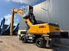 2015 Sennebogen 835E material handler, rear three-quarter view