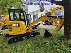 2023 Caterpillar 303.5E mini excavator, side view 2023 Caterpillar 303.5E mini excavator, side view