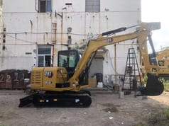 2011 Caterpillar 305.5E2 mini excavator side view 2011 Caterpillar 305.5E2 mini excavator side view