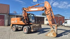 2010 Doosan DX190W wheel excavator, side view 2010 Doosan DX190W wheel excavator, side view