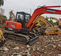Doosan DH55 crawler excavator, side view Doosan DH55 crawler excavator, side view