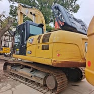 2024 Caterpillar 320GX crawler excavator, rear three-quarter view