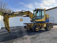 2000 CASE 788-PRR wheel excavator, side profile view