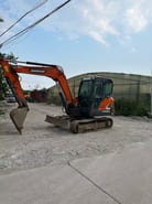 2018 Doosan DX55 mini excavator, side view