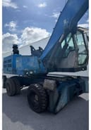 2010 Fuchs MHL320 material handler, side view