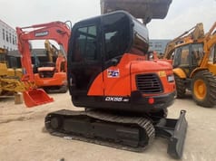 2023 Doosan DX55-9C mini excavator, side view