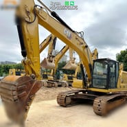 2023 Caterpillar 320 crawler excavator, front three-quarter view